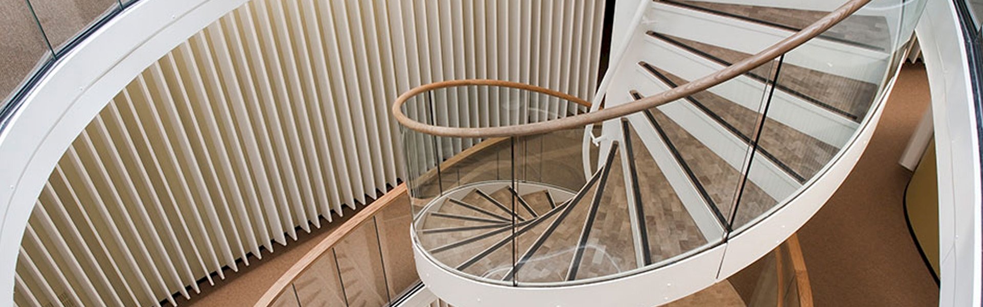 Wooden stairs with grip strips and clear step edges for better safety