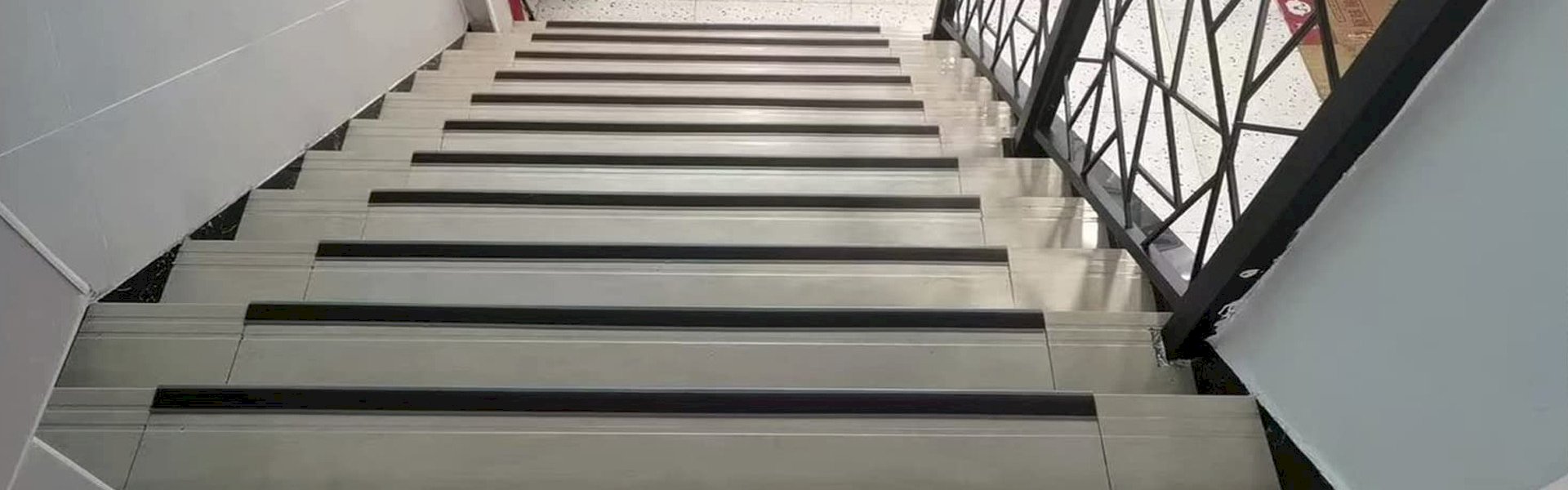 Aluminium stair nosing on indoor staircase edge